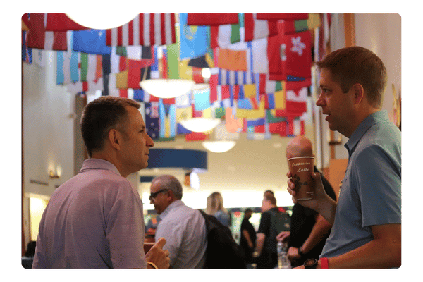 calvin talking to luc at devops midwest (1)