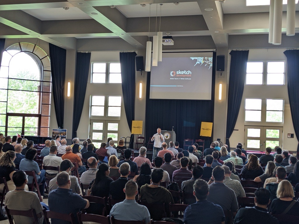 john krewson speaking at large event